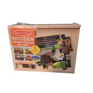 NWOT. Melissa & Doug Wooden Jigsaw
Puzzles in a Box 4 puzzles in one box